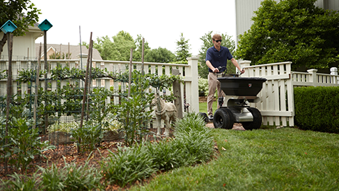 a person riding a lawn mower