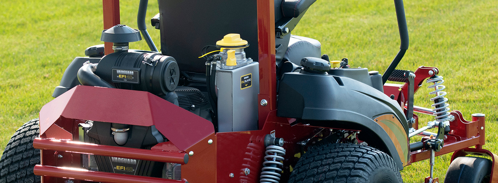 Man riding stand on commercial mower