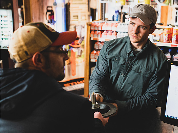 Ferris dealer talking to customer