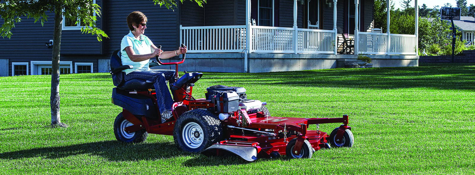 Women riding a ProCut S front mount mower