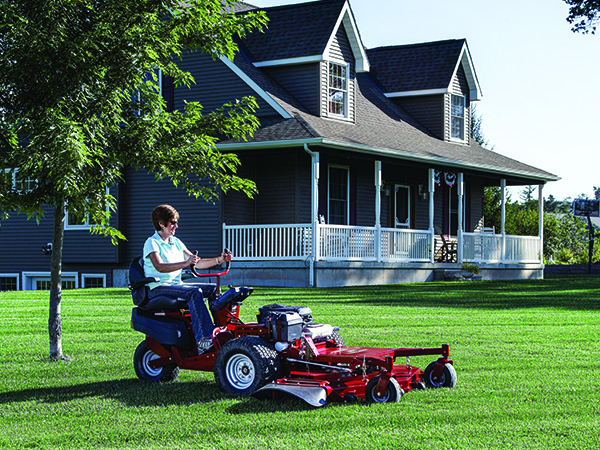 Women riding a ProCut S front mount mower