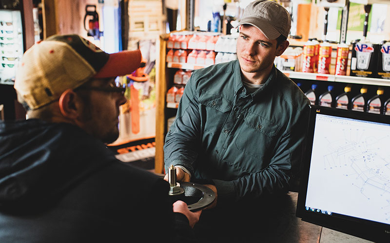 Dealer helping a consumer